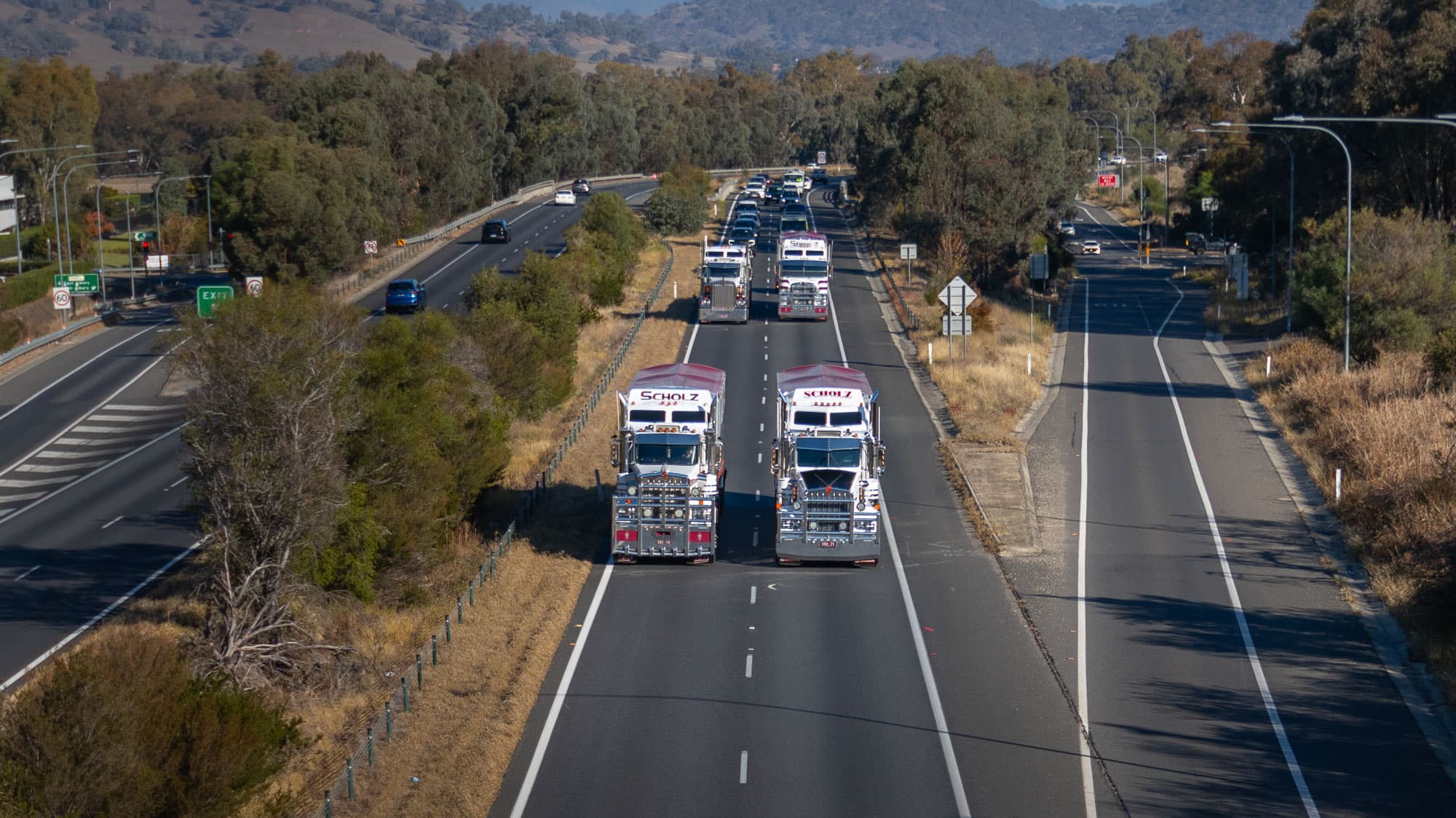 Professional trucking performance analytics showing fleet management and customer portal features